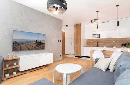 West Pomeranian Voivodeship Apartamento | Apartamento Blizej Morza 14/10 con dormitorio y balcón.