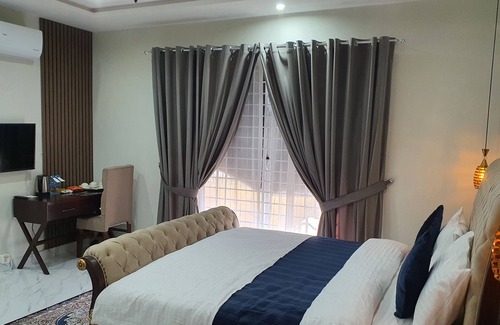 Fatehjang Casa | Bloom Rooms 10 minutes drive from Islamabad International Airport.