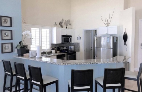 Alice Town Casa | Blue Beach Front Home at Resort World