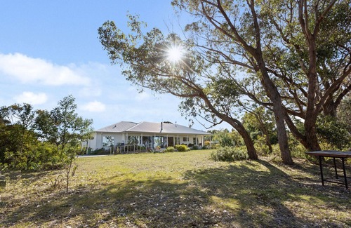 Raymond Island Casa | Blue Doors on the Lakes: Escape to a beautiful waterfront home on the Island