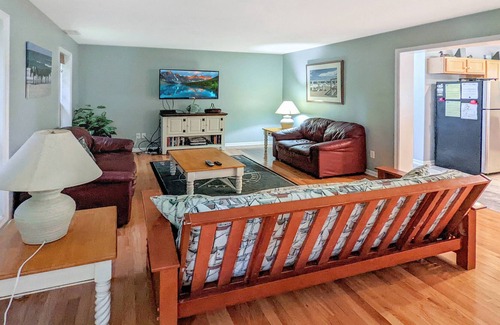 Piney Island Casa | Blue Heron, modern beach retreat with outdoor shower and screened porch