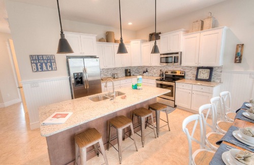 Bradenton Beach Casa | Blue Water Beach House: 5+ bdrm, 4. 5 baños, piscina climatizada / spa, 1. 5 cuadras de la playa
