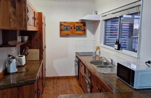 Snells Beach Casa | Bluebell Cottage on Matakana Coast Pet Friendly!