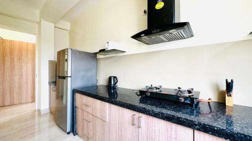 New Town Apartamento | BluO Lake View 1BHK New Town - Terrace Garden, Gym