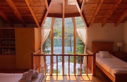 Puerto Manzano Casa | BOG Le Pommier - Cabañas con vista al lago y piscina climatizada