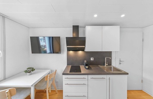 Herisau Apartamento | book2stay: Acogedor Estudio con cocina americana y lavadora