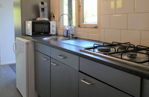 Marum Chalet De Esquí | Bosrijke omgeving op grens Friesland,Groningen en Drenthe