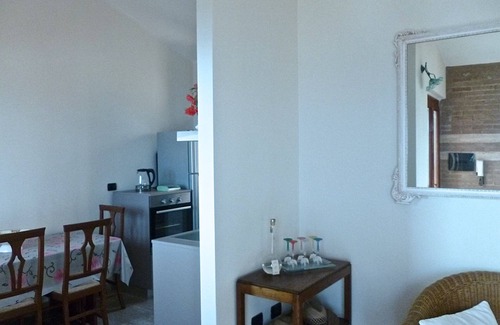 Funtana Meiga Apartamento | Apartamento Boutique VELA MEIGA - Impresionantes vistas al mar en el encantador Sinis