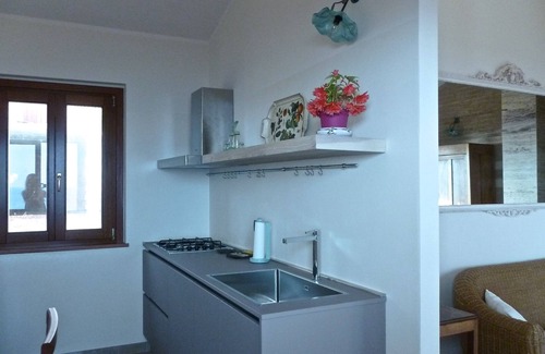 Funtana Meiga Apartamento | Apartamento Boutique VELA MEIGA - Impresionantes vistas al mar en el encantador Sinis