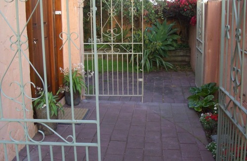 Orewa Apartamento | Alojamiento de vacaciones boutique junto a la playa.
