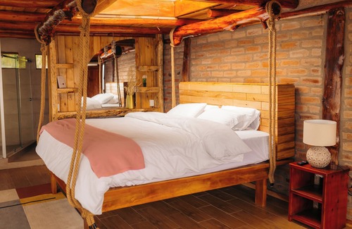Sierra Hotel | "Lodge boutique con jacuzzi y vistas únicas – El Cedro Soñado (Patate)"