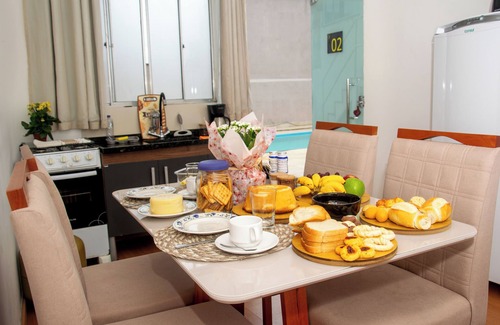 Ouro Preto Apartamento | Beth's accommodation with a solar-heated pool
