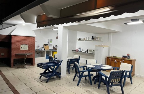 Praia do Pontal da Cruz Apartamento | Enjoy relaxing moments with your family in our cozy space.