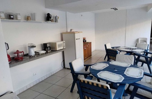 Praia do Pontal da Cruz Apartamento | Enjoy relaxing moments with your family in our cozy space.