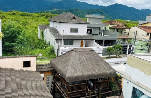 Vargem Grande Apartamento | Master suite with balcony. Recess of the pioneers.