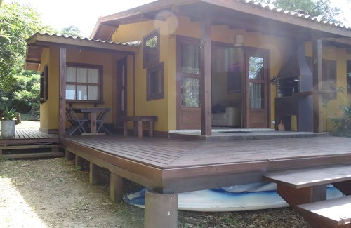 Florianopolis Casa | Delightful house on land with 5 beaches! Feet in the sand and peace!