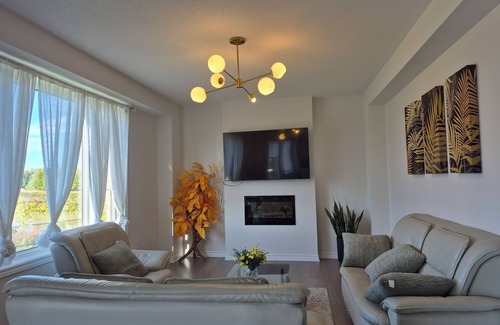 Wasaga Beach Villa | Brand new 4-bedroom,4-bathroom pond-front home in beautiful Wasaga Beach!
