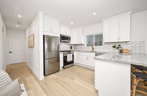 Sunset Beach Casa | Brand New Home by the Beach & Historic Sunset Water Tower