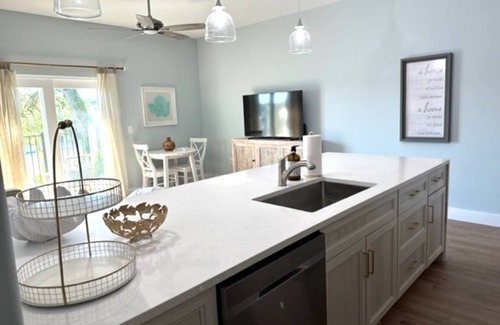 Tropic Casa | Brand new riverfront luxurious townhome with Interior designer finishes.