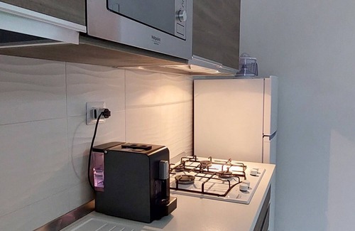Peschici Casa | Apartamento a estrenar de tres habitaciones con terraza, piscina y clima.