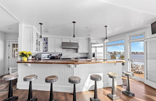 Scituate Casa | Breathtaking harbor views from spacious beachfront home.