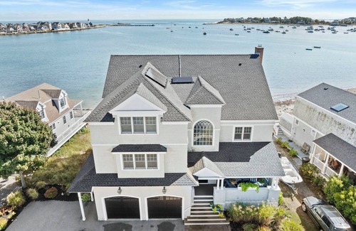 Scituate Casa | Breathtaking harbor views from spacious beachfront home.