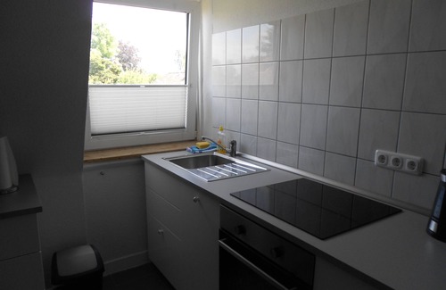 Gaarden-Sud - Kronsburg Apartamento | Luminoso apartamento de 2 dormitorios con vistas al bosque.