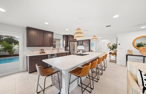 Venetian Way Casa | Bright and Beachy Pool Home