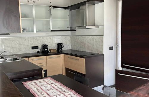 Ziano di Fiemme Apartamento | Bright and comfortable apartment with mountain views.
