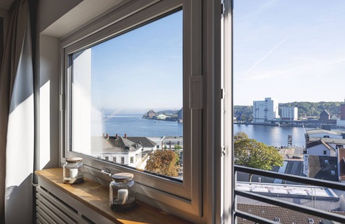 Flensburg Apartamento | Apartamento luminoso y moderno, con excelentes vistas al fiordo, incl. estacionamiento