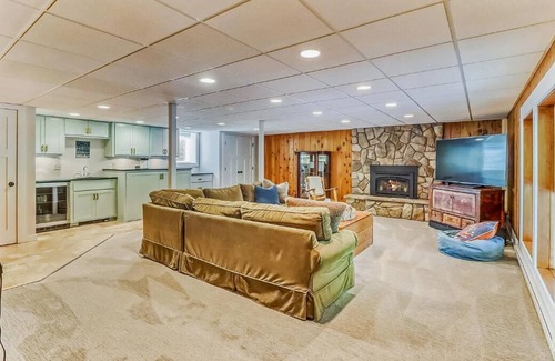 Detroit Lakes Casa | Bright and Modern Luxe on Long. Peloton bike in unit