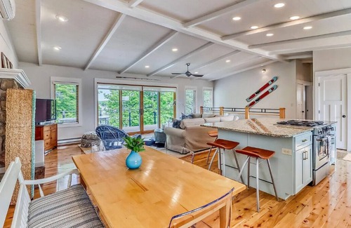 Detroit Lakes Casa | Bright and Modern Luxe on Long. Peloton bike in unit