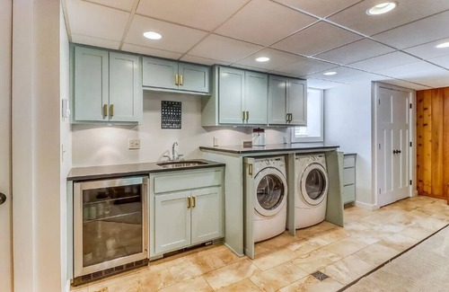 Detroit Lakes Casa | Bright and Modern Luxe on Long. Peloton bike in unit