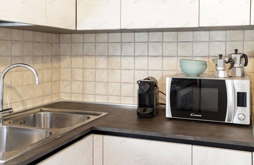 Paquier Apartamento | Bright apartment in the town center with ski storage and communal parking.