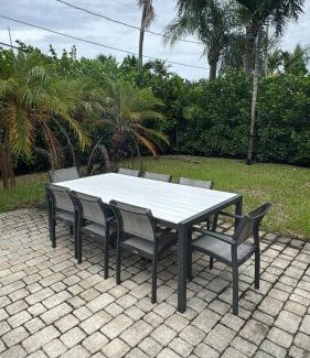 South Corals Villa | Bright Fort Lauderdale Villa with Private Heated Pool, Modern Décor and Palm-Lined Outdoor Oasis