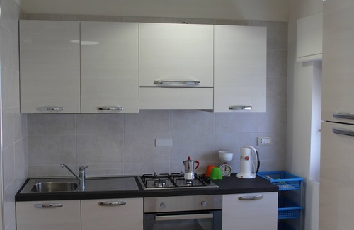 Province of Cagliari Apartamento | Luminoso, espacioso y confortable apartamento en el 4 ° y último piso, zona Poetto