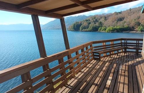 Caburgua Apartamento | Cabaña Celeste - Acceso directo a playa lago Caburgua y cancha de tenis - direct access Beach in Caburgua Lake and tenis court