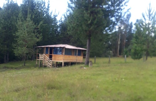 Arcabuco Cabina | cabaña rodeada de la nuraleza