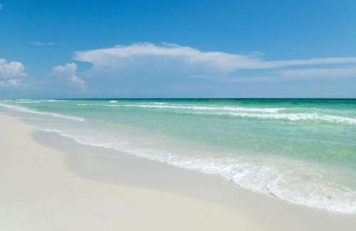 Panama City Beach Casa | Calypso 3 New Relax Unwind Luxury PCB next to Pier Park 3 Bed 2 Bath Pool Hot Tub Tikki bar