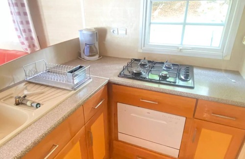 Le Grand Serre Casa | Camping le Grand Cerf **** - Premium 6-person mobile home with covered terrace, 3 bedrooms, air conditioning, dishwasher, TV for 6 people