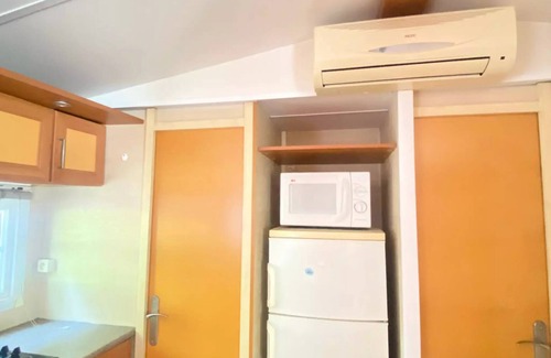 Le Grand Serre Casa | Camping le Grand Cerf **** - Premium 6-person mobile home with covered terrace, 3 bedrooms, air conditioning, dishwasher, TV for 6 people