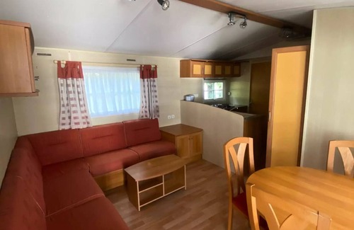 Le Grand Serre Casa | Camping le Grand Cerf **** - Premium 6-person mobile home with covered terrace, 3 bedrooms, air conditioning, dishwasher, TV for 6 people