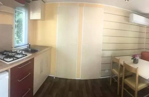 Saint-Jean-Pla-de-Corts Chalet De Esquí | Campsite Les Casteillets *** - Chalet Comfort 16 m2 - 1 bedroom - air conditioning (extra sleeping possibility) 4 persons