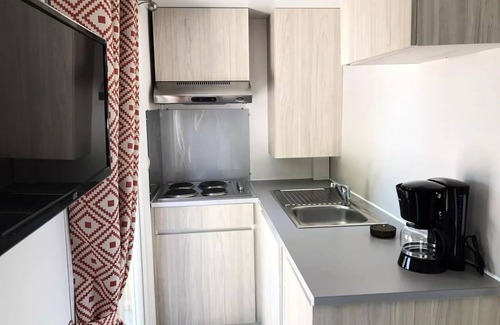Le Grez Casa | Campsite Les Tournesols *** - Mobilhome Evolution 45m2 (24m2+21m2 terrace) - 2 bedrooms 4 people
