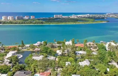 Bay Isle Casa | Canal-front home with a dock, GULF VIEWS, Shell Beach access.