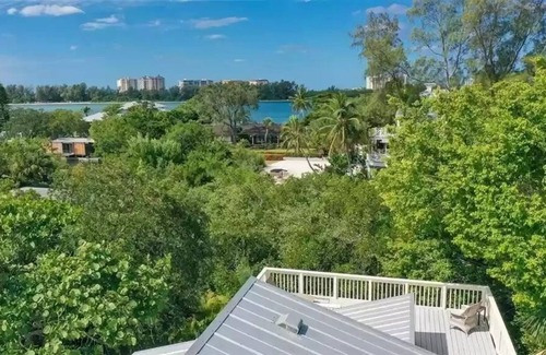 Bay Isle Casa | Canal-front home with a dock, GULF VIEWS, Shell Beach access.