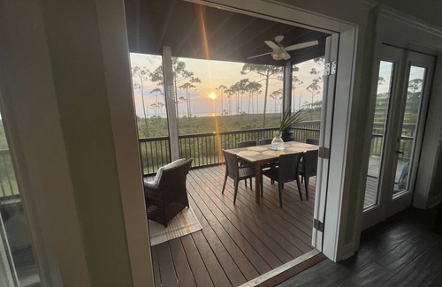 Port St. Joe Casa | Captivating Bay Front home with stunning sunsets New dock/kayak launch in 2025!