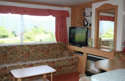 Beddgelert Casa | Caravana propia jardín privado. aparcamiento iluminado, aspecto abierto aislado, vistas a la montaña.