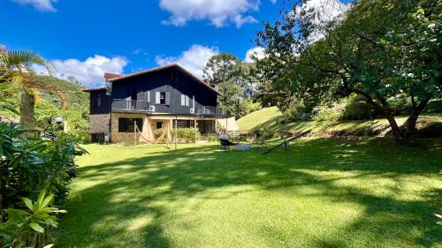 Teresopolis Casa | Casa 03 Vale Boa Vista - Charme Rústico em Condomínio com Área de Lazer Completa