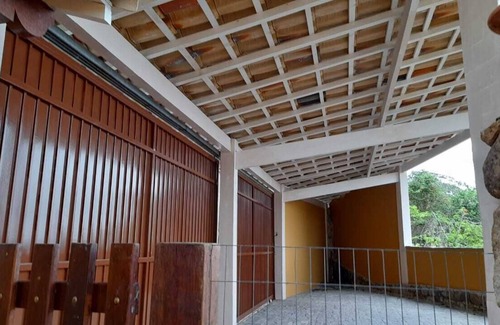 Pereque Casa | Casa Amarela com Vista Inesquecivel